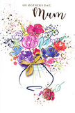 This Mother's Day card presents a radiant, painterly bouquet that seems to dance across the page, echoing the lively energy of Bayswater's streets around Portobello Road and the calm of nearby garden squares. At the heart of the design, lush purple and pink blossoms cluster together, their rounded forms reminiscent of roses and peonies rendered in loose, expressive watercolour. Bright cerise and magenta petals are balanced by cooler blue and lavender flowers, creating a sense of harmony and depth, as if the bouquet had just been gathered from a spring market. Dark indigo brushstrokes define the petals and stems, weaving through the colours and giving the impression of real, layered foliage. Wisps and flecks of gold ink highlight the outer edges of petals, catching the imagination like a glimmer of morning light on a fresh bouquet set in a Bayswater townhouse. Around the central flowers, scattered dots and splashes of colour drift across the white card, evoking the feeling of tossed petals or the confetti of a family celebration. The stems rest in a softly contoured vase at the bottom, gently suggested with washes of colour and finished with a precise golden bow at its waist, echoing the touch of a florist's hand on ribbon. Overall, the card conveys warmth, joy, and heartfelt appreciation, a painted embrace perfectly suited to expressing love for a mum on Mother's Day.